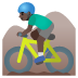 man mountain biking, dark skin tone